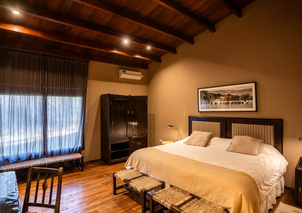 Guest bedroom with storage for hunting gear at Escondido
