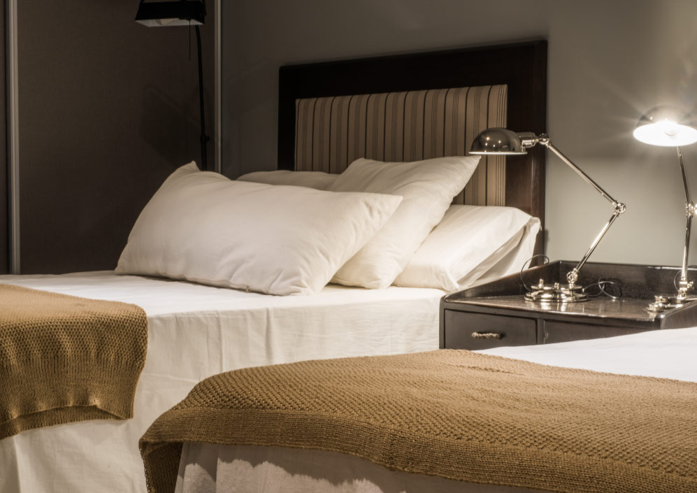 Renovated bedroom interior at Escondido Lodge